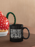 Badass Feminist Mug — "I’m a Badass Feminist Who Believes That a Child Needs 2 Parents" Black Coffee Mug